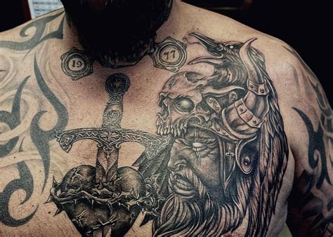 chest meaningful tattoos|unique chest tattoos for men.